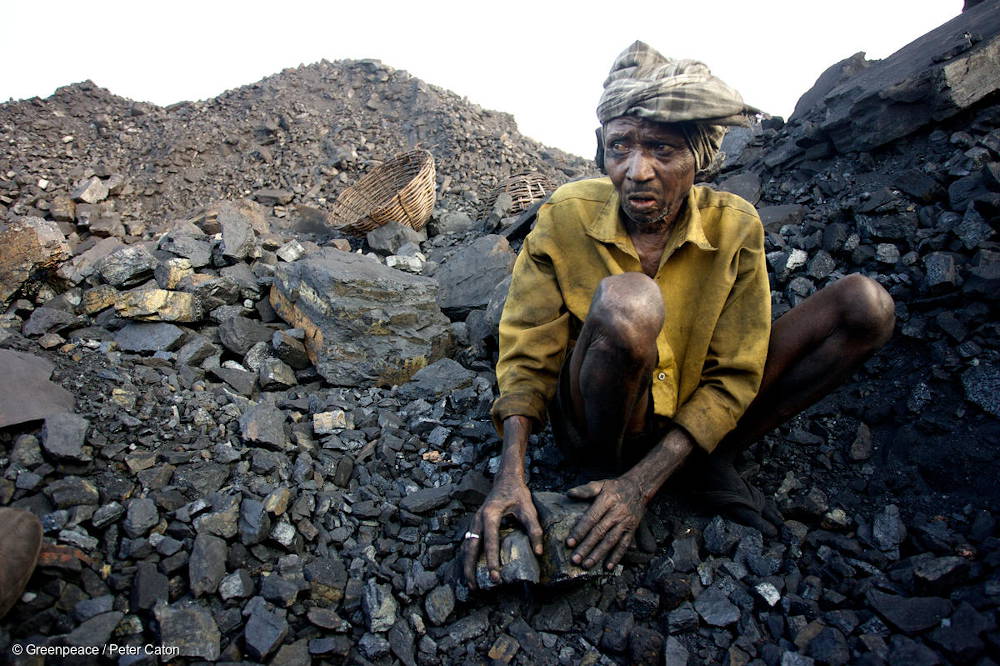 Coal mine worker in India
